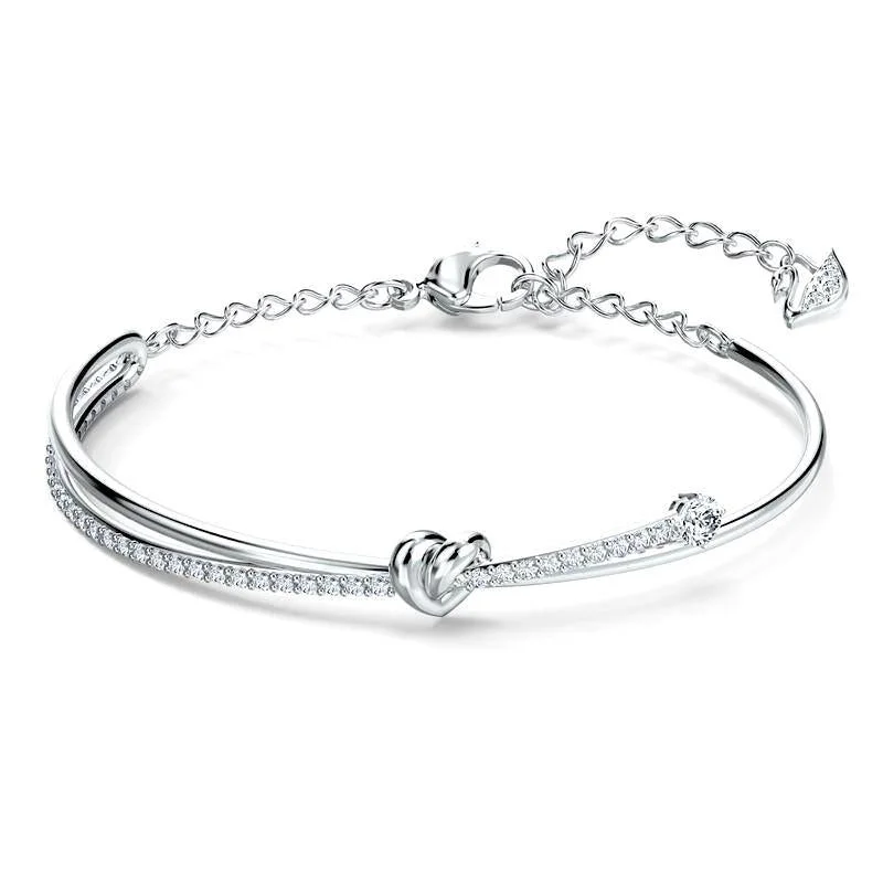 Wood - Carved Bangles with Intricate Celtic Patterns Swarovski Lifelong Heart Crystal White Rhodium Plated Bangle Wood - Carved Bangles with Intricate Celtic Patterns Swarovski Lifelong Heart Crystal White Rhodium Plated Bangle
