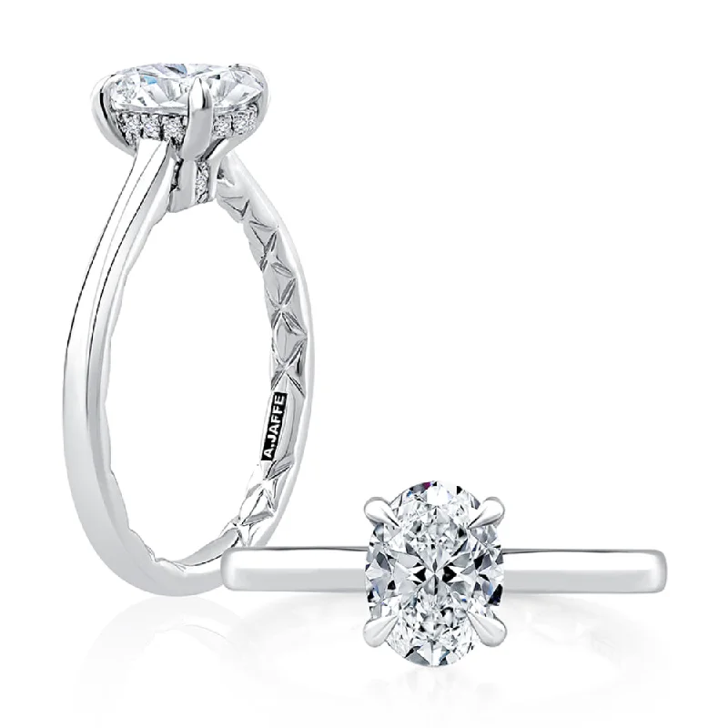 Engagement Rings with Sapphire and Diamond Combinations in a Vintage StyleA. Jaffe Hidden Halo Cut Diamond Solitaire Engagement Ring with Quilted Interior Engagement Rings with Sapphire and Diamond Combinations in a Vintage StyleA. Jaffe Hidden Halo Cut Diamond Solitaire Engagement Ring with Quilted Interior