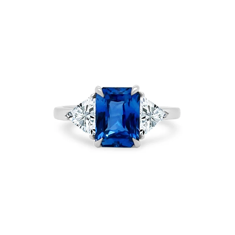 Halo Engagement Rings with a Cushion - Cut Center Diamond and Rose Gold BandEmerald Cut Sapphire with Trillion Cut Diamond Side Stones Halo Engagement Rings with a Cushion - Cut Center Diamond and Rose Gold BandEmerald Cut Sapphire with Trillion Cut Diamond Side Stones