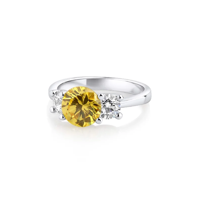 Solitaire Engagement Rings with a High - Clarity Round Diamond and Tapered BandRADIANCE RING WITH CANARY STONE Solitaire Engagement Rings with a High - Clarity Round Diamond and Tapered BandRADIANCE RING WITH CANARY STONE