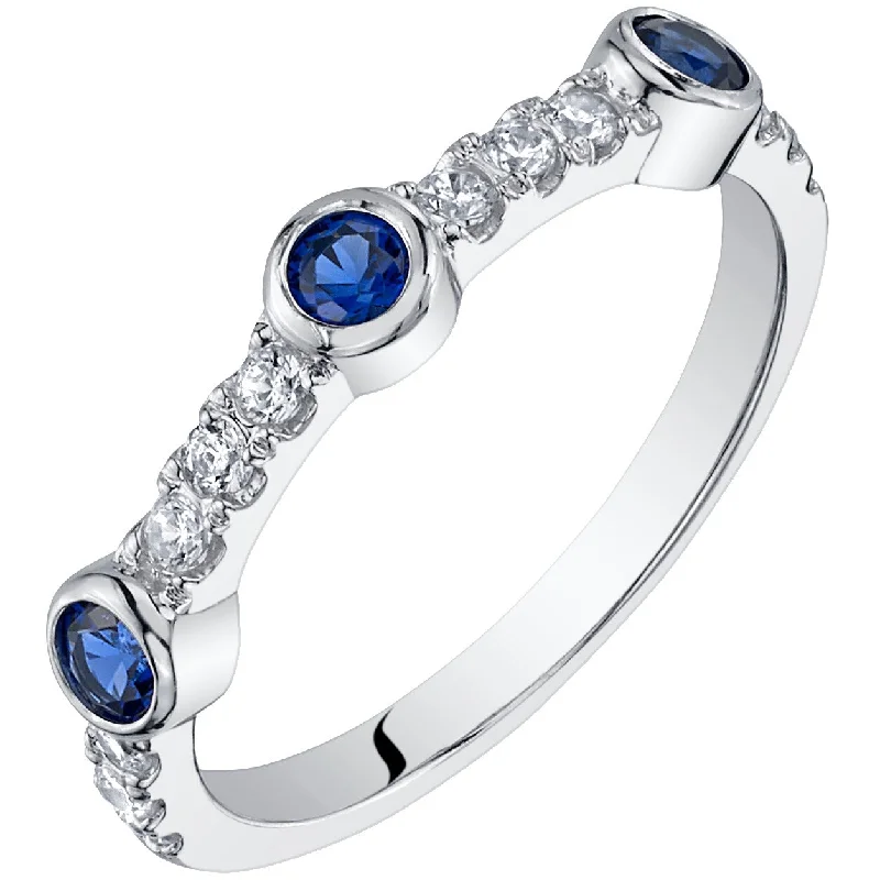 Sapphire Gemstone Rings in 18K White Gold with Diamond Accents for an Elegant EngagementSterling Silver Created Blue Sapphire Bezel Half Eternity Ring